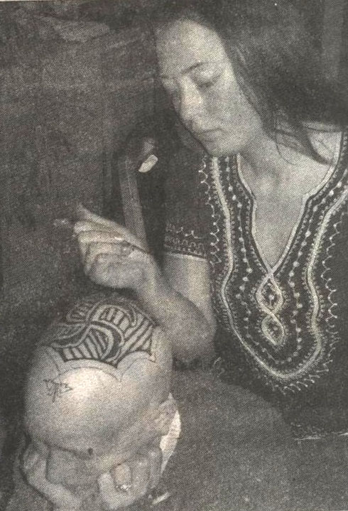 Hilary applying henna